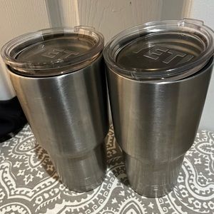 2 used Yetis with lids